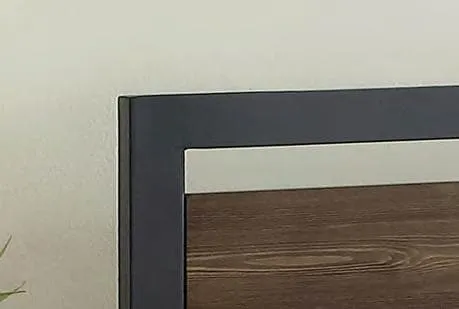 Wood Panel Bed With a Grey Steel Frame Headboard